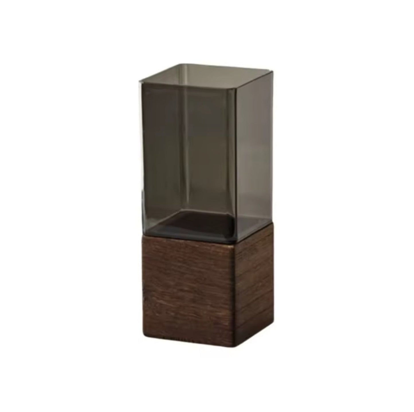 The Atelier Vase in smoke-tinted acrylic with a dark wood square base