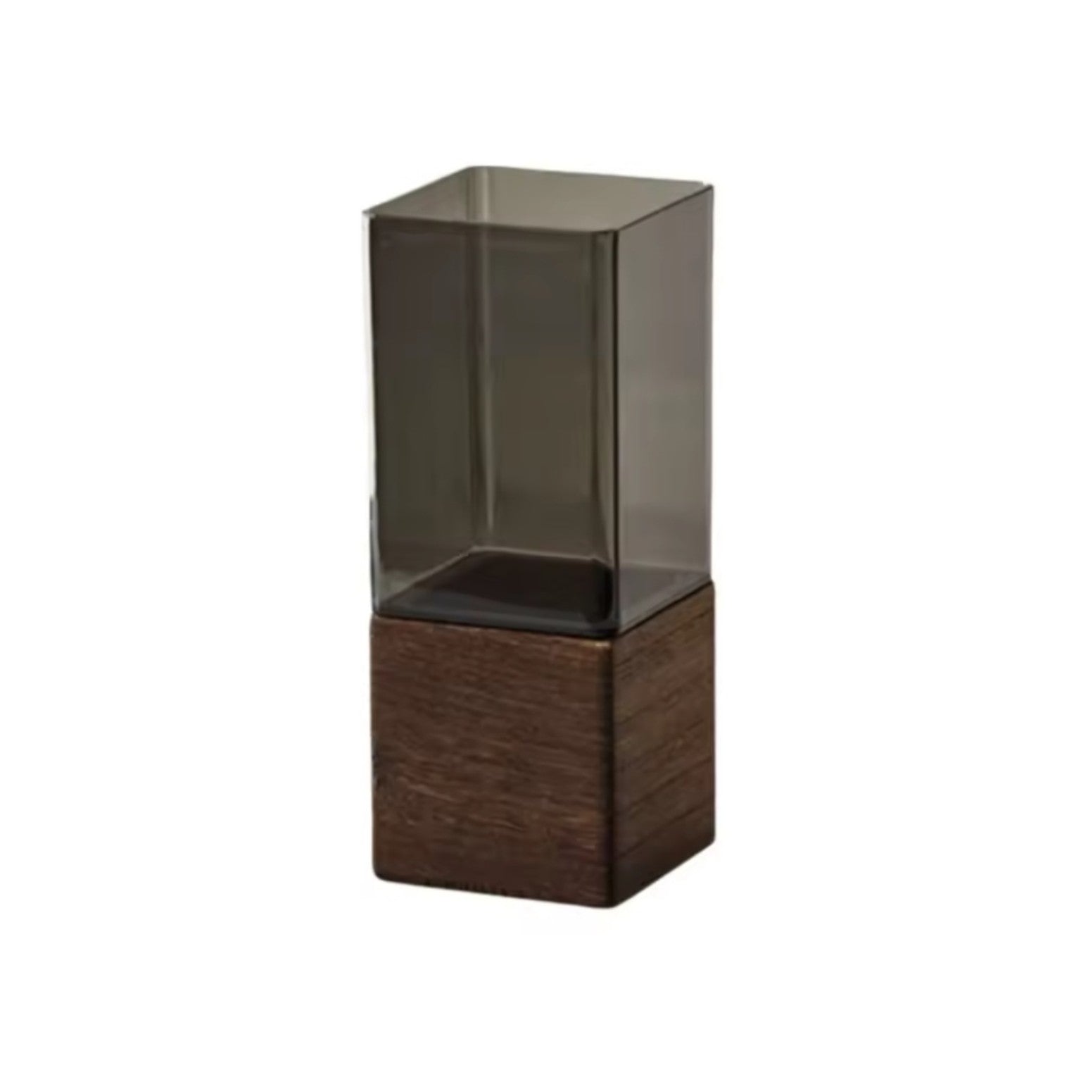 The Atelier Vase in smoke-tinted acrylic with a dark wood square base
